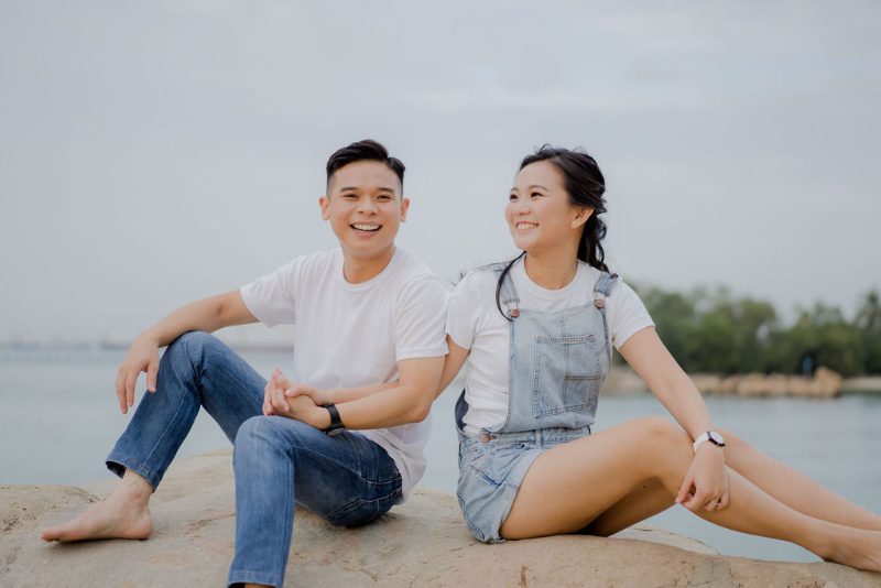Happy couple embracing after reuniting through Love Spells in Singapore 