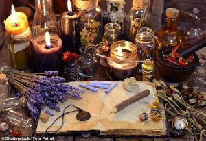 Wiccan love spell altar with candles, herbs, and magical symbols for love rituals