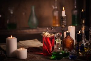 A love spell ritual involving red candles and personal items.