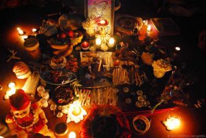 Performing a Voodoo love spell with spiritual tools