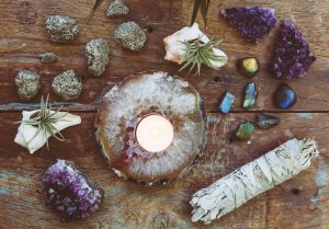 Spiritual cleansing with traditional herbs and protective charms inside an African temple.