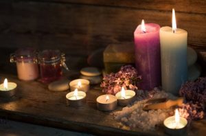 Spiritual tools and candles used by Prof Eric Galandi to select the correct love spell.