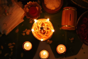 Spiritual guidance symbols (tarot, candle, crystals)